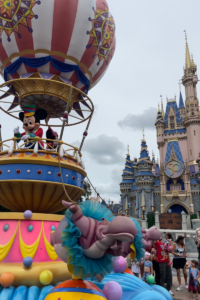 Disney World Magic Kingdom: Festival of Fantasy Parade with Mickey Mouse Float and the Cinerella's Castle 50'th Anniversary